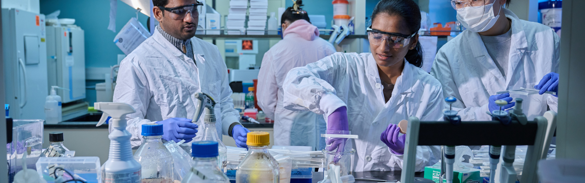 Students conducting research in a lab.