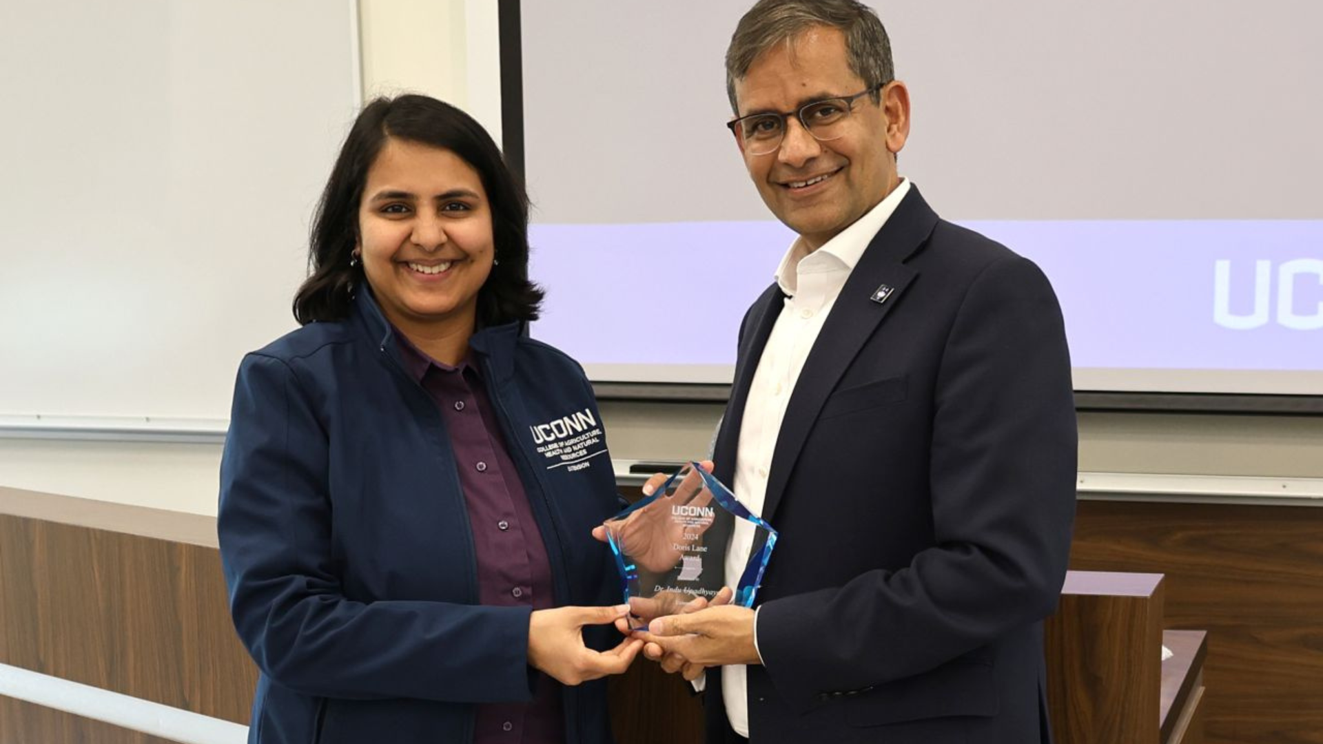 Dr. Indu Upadhyaya posing for a photo alongside Dean Indrajeet Chaubey.