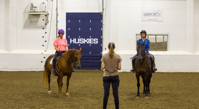 Students Receiving Instructions While on Horses